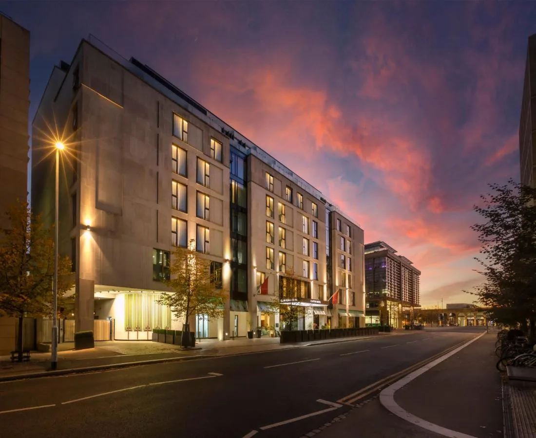Exterior view of Clayton Hotel Cambridge on Station Road at night