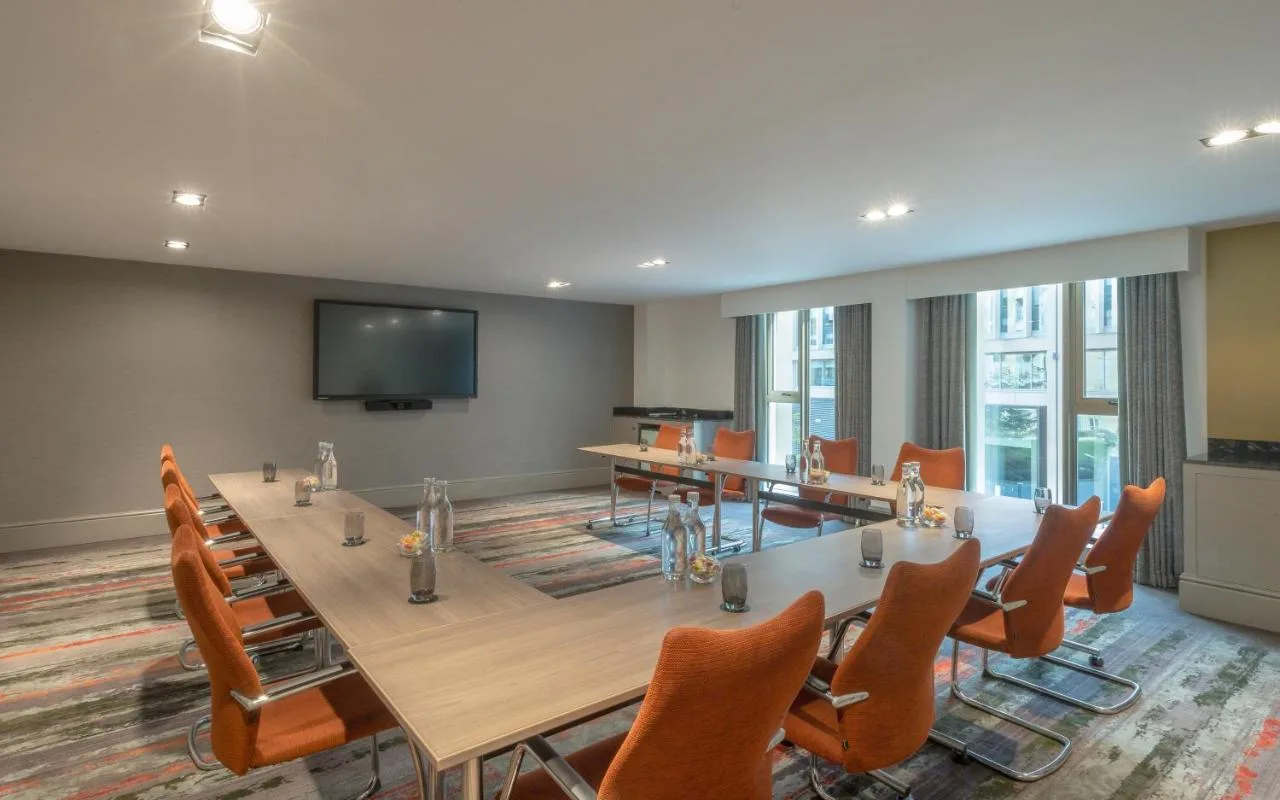 Conference room with table and chairs at the hotel