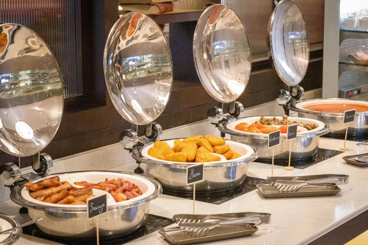 Breakfast buffet with bowls of food